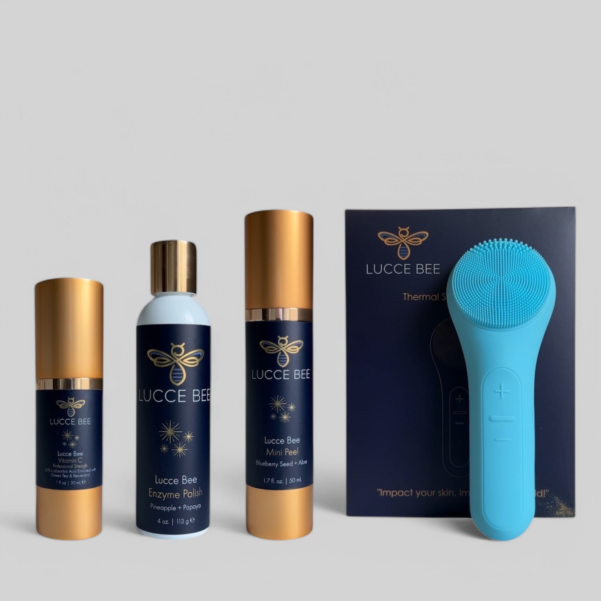 Lucce Bee complete skincare set with Vitamin C Serum, Enzyme Polish, Mini Peel, and blue Thermal Sonic Facial Brush for radiant, smooth, and rejuvenated skin