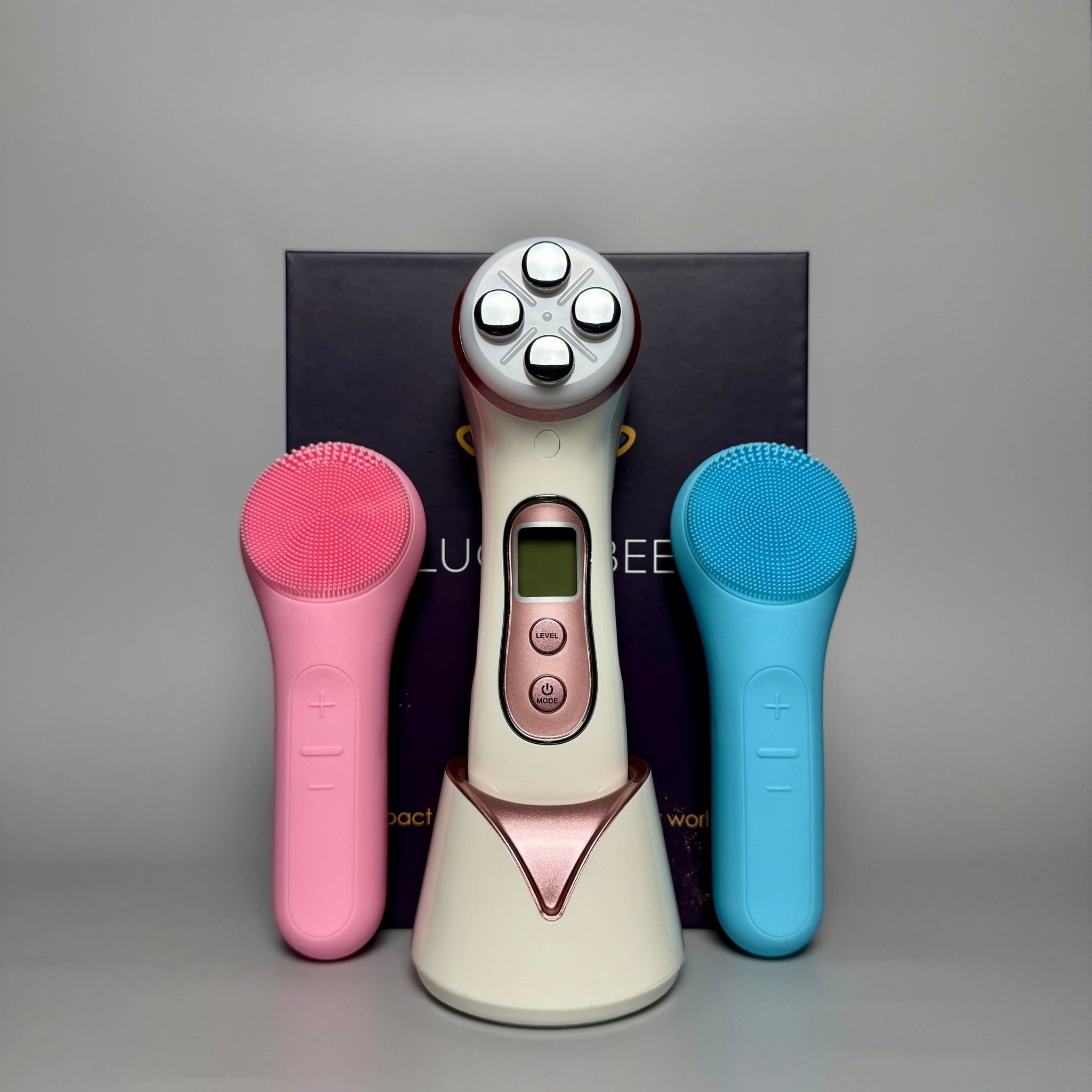 Lucce Bee 5-in-1 LED facial device with red, blue, green, yellow, and pink light therapy plus pink and blue silicone sonic cleansing brushes. Anti-aging, acne-fighting, skin tightening tools for deep cleansing, collagen boost, and radiant skin.